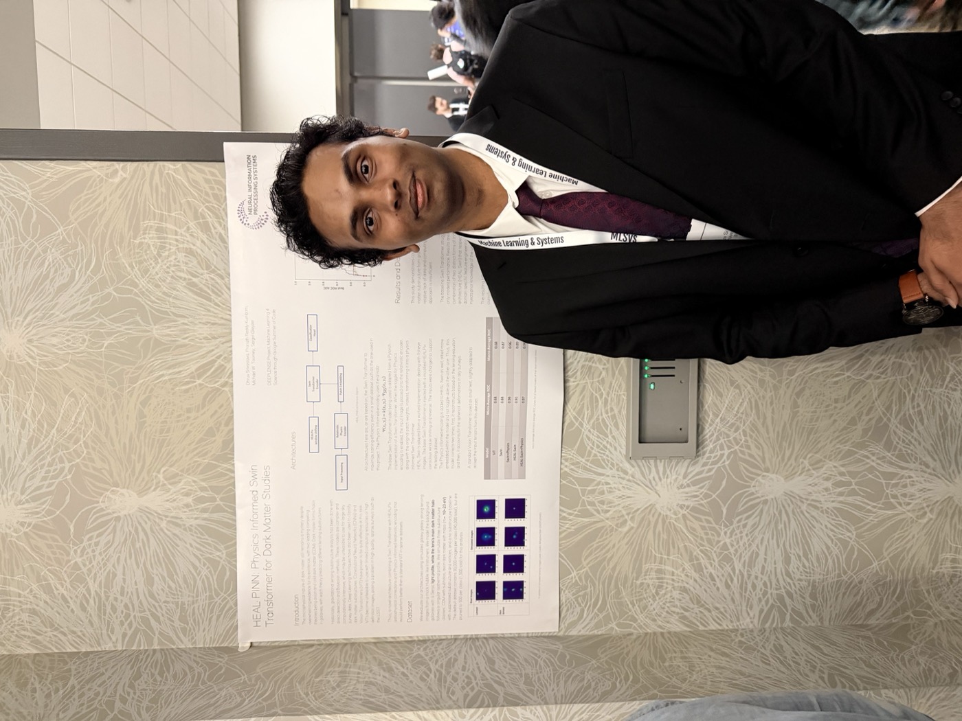 Researcher presenting the HEAL-PINN poster at NeurIPS 2025
