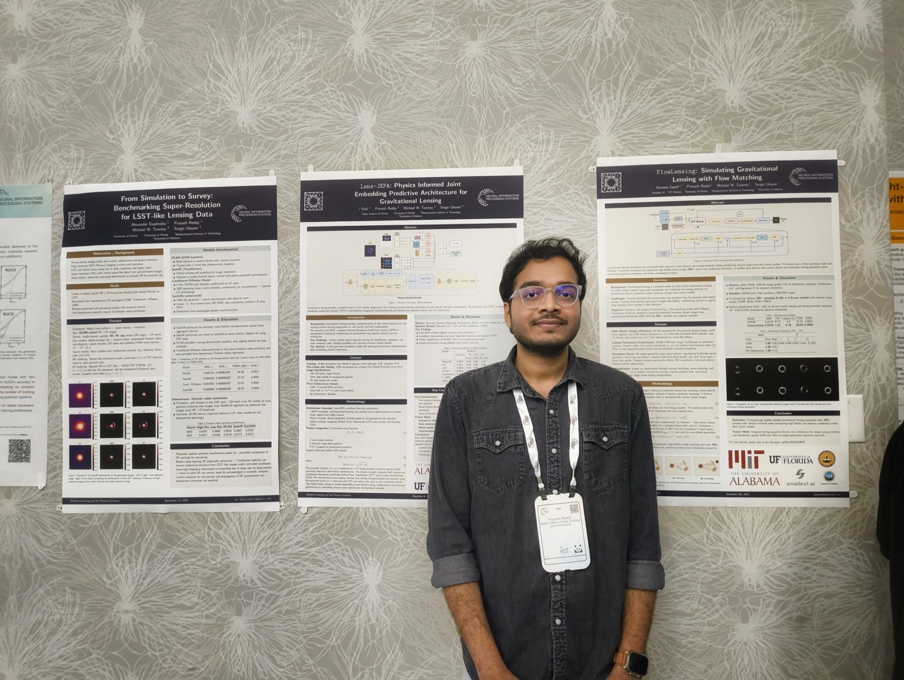DeepLense researcher standing with three research posters at NeurIPS 2025